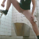 A girl takes a runny shit while bending over in front of a metal wall toilet in a public restroom in 2 scenes. She shows us the mess in the bowl at the end of each shot. Some pissing. Presented in 720P HD. About 2.5 minutes.